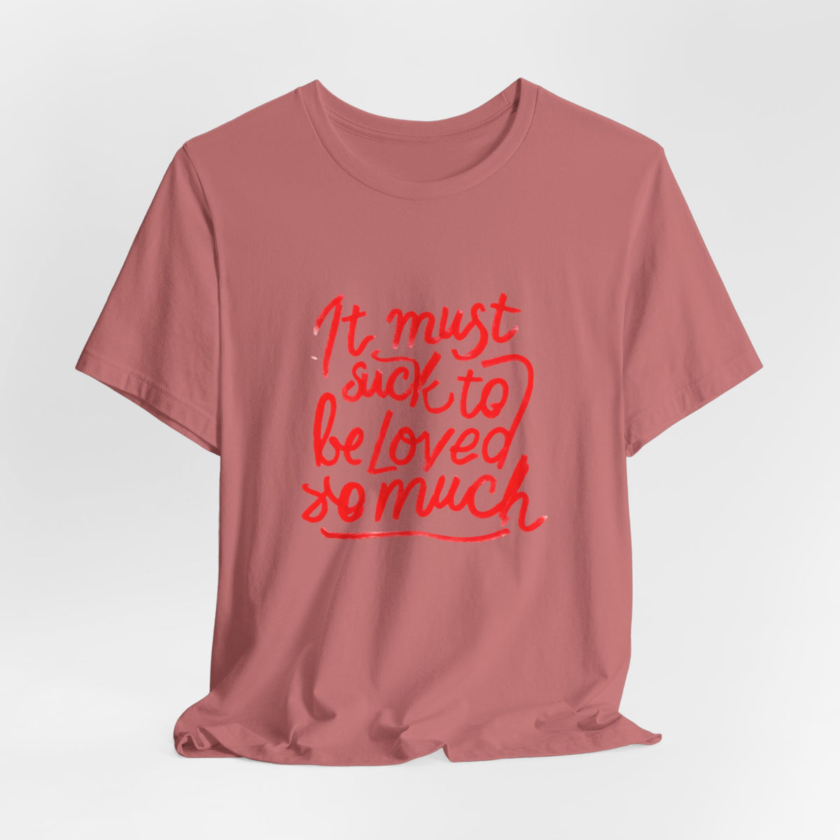 T‑Shirt — “It Must Suck to Be Loved So Much” Red Script Tee
