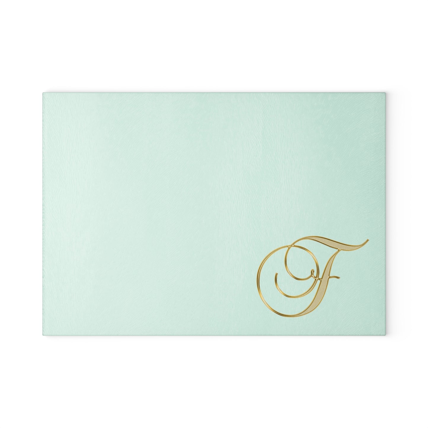 Monogram Glass Cutting Board — Elegant Gold Script "F" on Mint