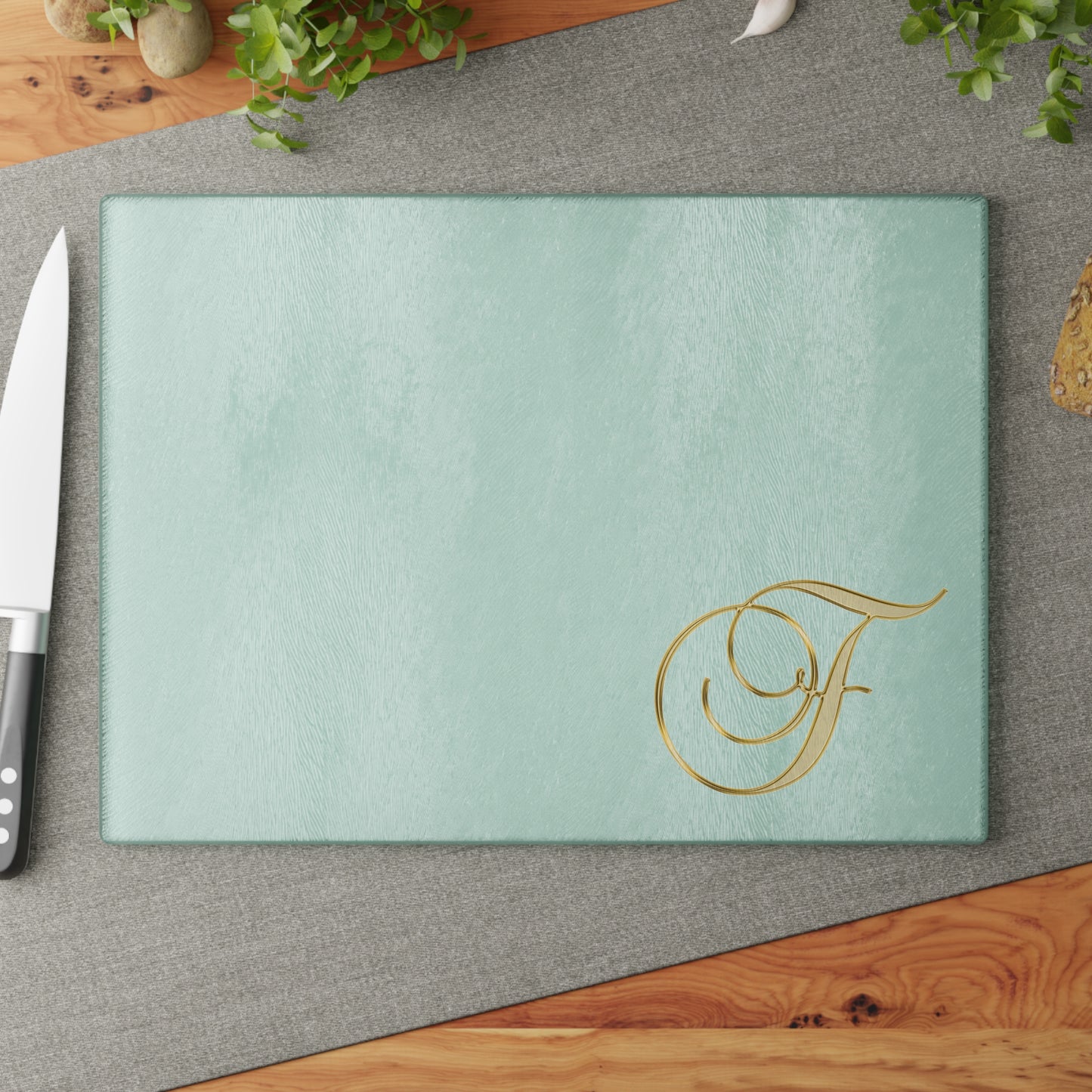Monogram Glass Cutting Board — Elegant Gold Script "F" on Mint