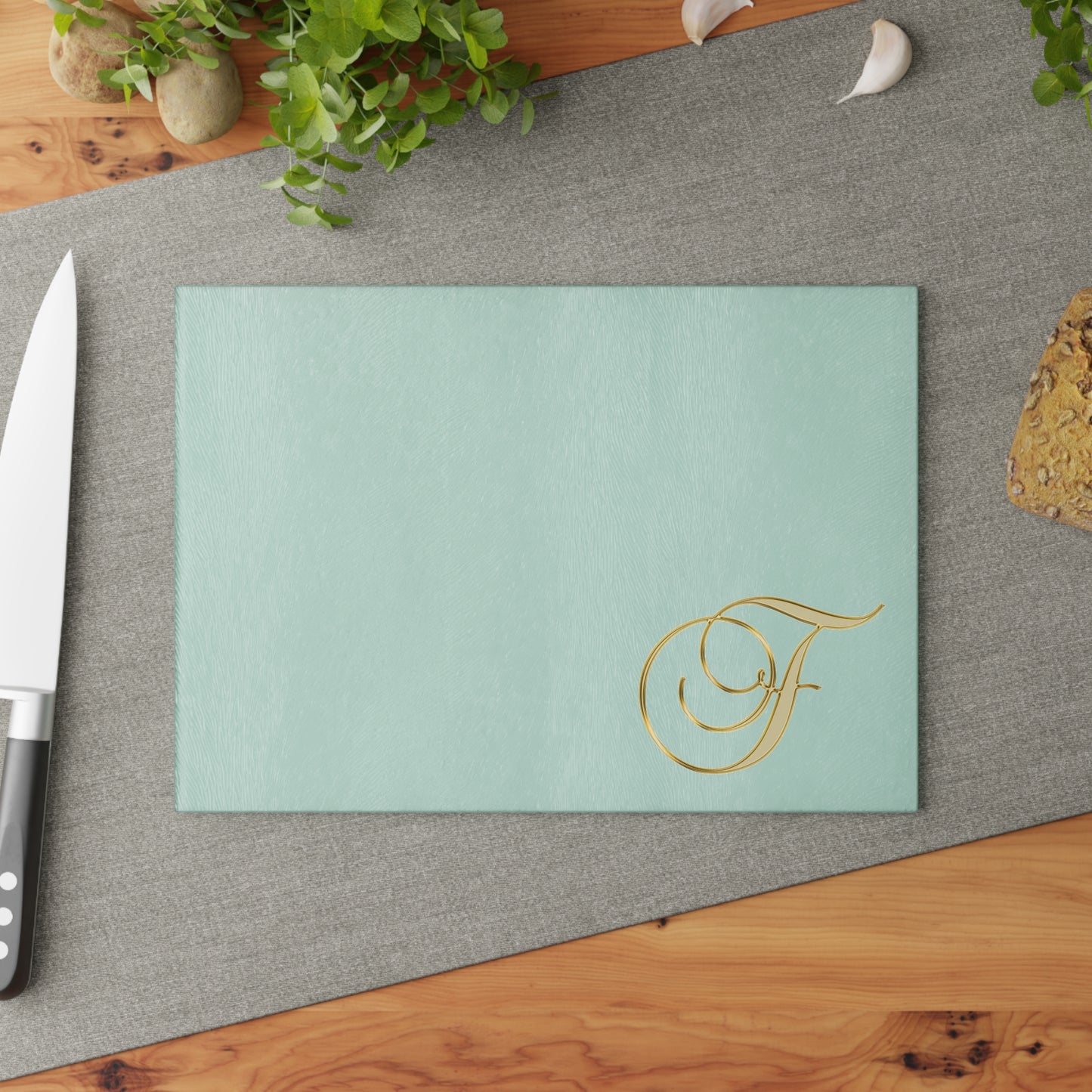 Monogram Glass Cutting Board — Elegant Gold Script "F" on Mint